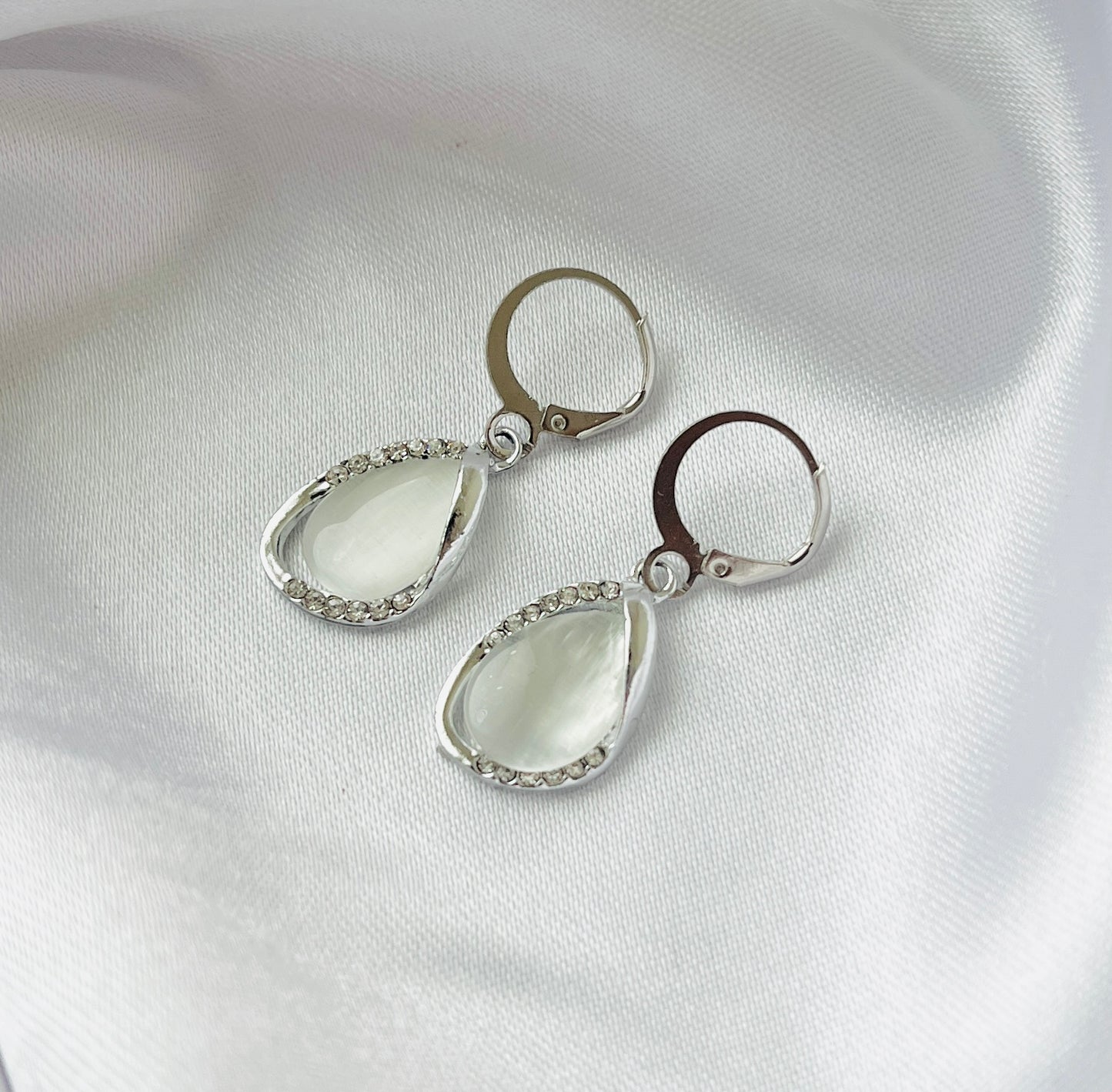 Trendy Silver Raindrop AD charm Hoop earrings for women and girls